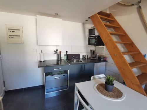 Η κουζίνα ή μικρή κουζίνα στο Esprit du Sud - Appartement cosy proche centre -
