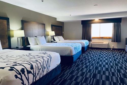 Кровать или кровати в номере La Quinta Inn by Wyndham Steamboat Springs