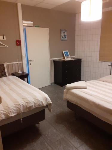 Katil atau katil-katil dalam bilik di Wenceslas cobergher appartement I