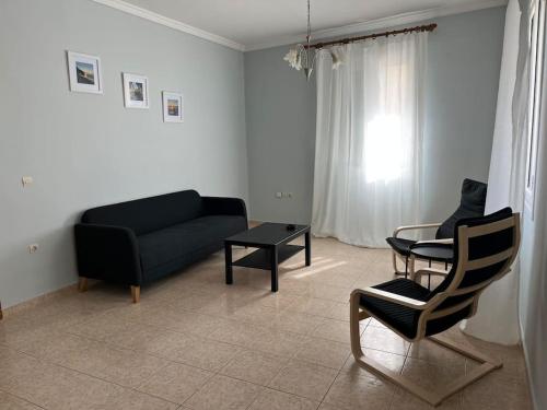 A seating area at Lixouri Center Apartment