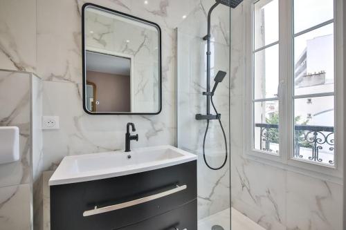 Kúpeľňa v ubytovaní 3G#Appart 6Pers#2 Chambres#Commerce#Paris 15#AC