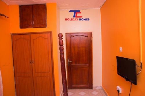 TV a/nebo společenská místnost v ubytování Lovely 3-Beds - Prosper House in Kampala - Uganda