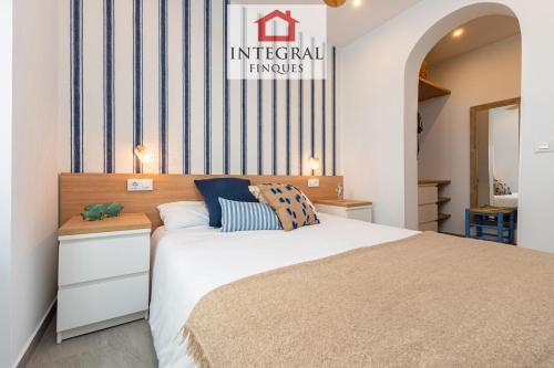 Posteľ alebo postele v izbe v ubytovaní Les Terrasses Apartament Palamós