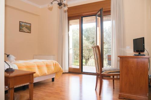 Postel nebo postele na pokoji v ubytování Ruggiero Park Hotel