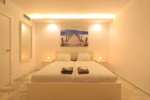 Postel nebo postele na pokoji v ubytování Modern Beach Penthouse