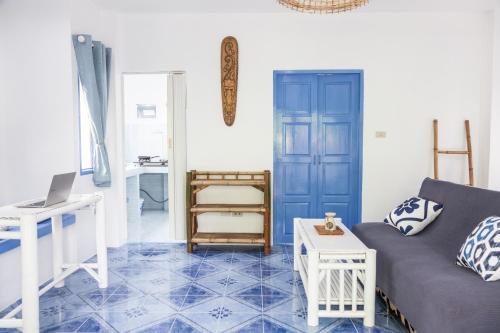Ένα ή περισσότερα κρεβάτια σε δωμάτιο στο Archie Village