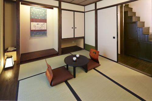 Χώρος καθιστικού στο Kyomachiya Ryokan Sakura Urushitei