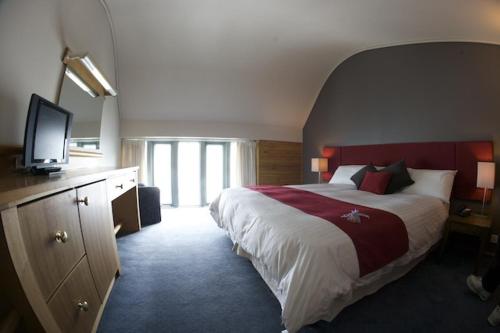En eller flere senge i et værelse på The Perisher Valley Hotel