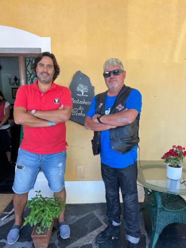 two men standing next to each other with their arms crossed at Quinta Castanheiro da Penha - Alegrete - Portalegre - Alentejo in Alegrete