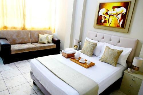 Ruang duduk di Elegante B1 Suite estudio Riocentro Norte Alborada