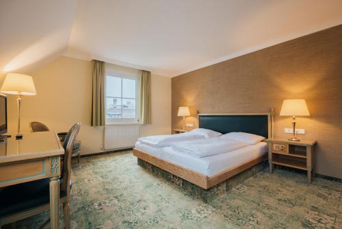 Postel nebo postele na pokoji v ubytování Hotel Bären