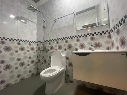 Koupelna v ubytování Rihiveli Inn