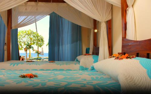 Postel nebo postele na pokoji v ubytování Holiway Garden Resort & SPA - Bali - CHSE Certified Hotel
