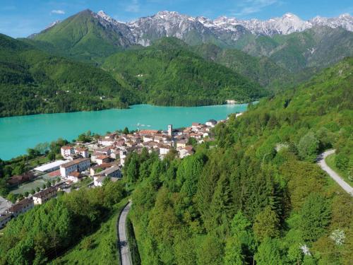 an aerial view of a small town next to a lake at Apartment Albergo Diffuso - Cjasa Ustin-5 by Interhome in Barcis