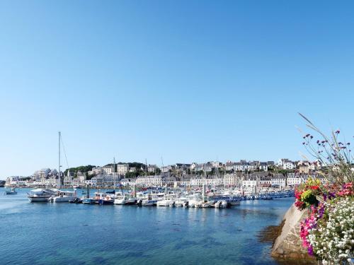 a group of boats docked in a harbor at Holiday Home Ty ar Bilie by Interhome in Primelin