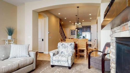 a living room with a couch and a dining room at The Beach House townhouse in Washington