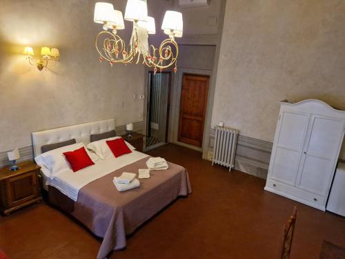 Postel nebo postele na pokoji v ubytování B&B i Rinascimenti