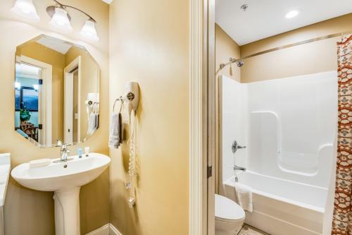 a bathroom with a sink and a toilet at Summit Manor Condos Unit B3052 in Gatlinburg
