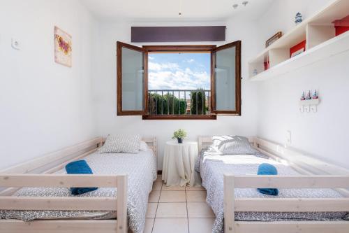 Postel nebo postele na pokoji v ubytování Casa Arturo