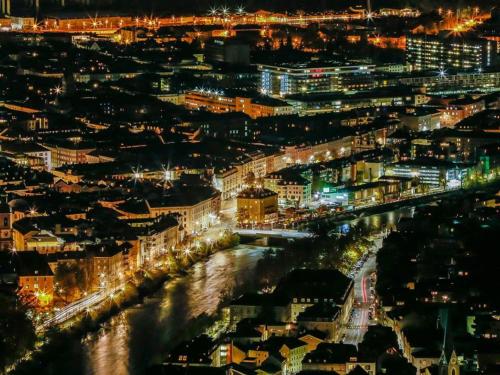 an aerial view of a city at night at Holiday Home Vogelhütte by Interhome in Innsbruck
