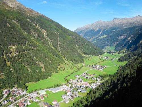 an aerial view of a village in the mountains at Apartment Top 1 by Interhome in Kaunertal