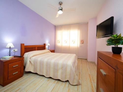 מיטה או מיטות בחדר ב-Apartment Perlamar-2 by Interhome
