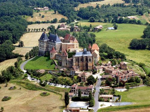 an aerial view of a large house on a hill at Holiday Home Au Cayroux by Interhome in Blanquefort-sur-Briolance