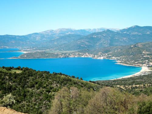 a view of crater lake from the top of a mountain at Holiday Home La Pinède- bungalow 6 pers- by Interhome in Sagone