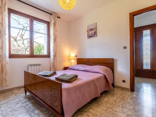 Katil atau katil-katil dalam bilik di Apartment Casa Antoinette by Interhome