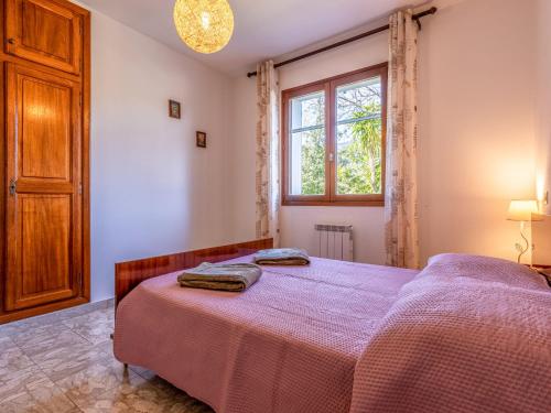 Katil atau katil-katil dalam bilik di Apartment Casa Antoinette by Interhome