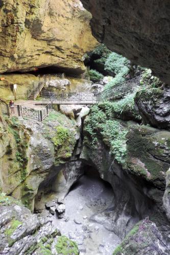a bridge on the side of a rocky cliff at Apartment Villa Margherita-3 by Interhome in Anduins