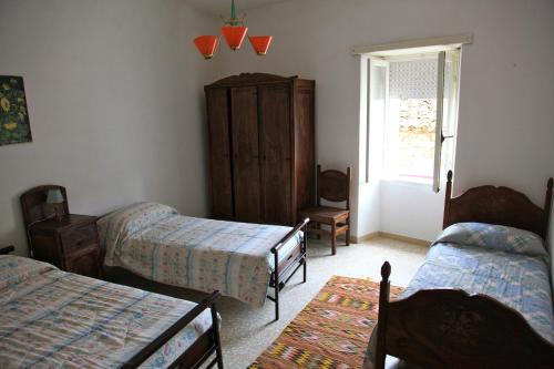 Postel nebo postele na pokoji v ubytování B&B Notte Al Museo