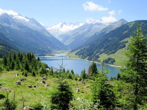 a view of a valley with a lake and mountains at Apartment Eberharter-5 by Interhome in Aschau