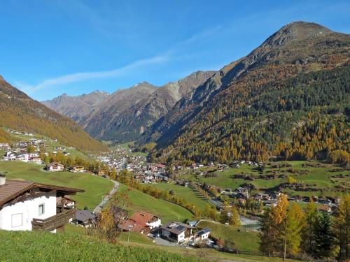 a small town in a valley in the mountains at Apartment Nadine-8 by Interhome in Sölden