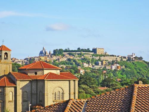 a view of a town with houses and a church at Holiday Home Casale Vitello by Interhome in Proceno
