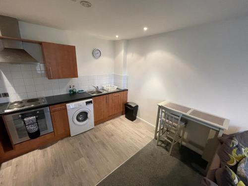 Kuchyň nebo kuchyňský kout v ubytování Albert Gate Apartment TSAC