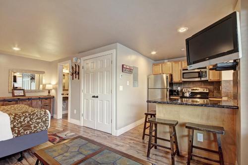 a room with a kitchen and a living room at Village at Breck V4309 in Breckenridge