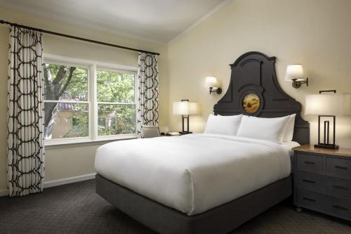 a bedroom with a large bed and a window at Fairmont Sonoma Mission Inn & Spa in Sonoma