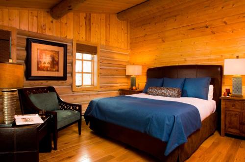 Cama o camas de una habitación en Trappers Cabin