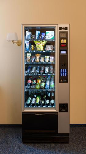 a vending machine with food and drinks in it at PrivatHotel Probst in Nürnberg
