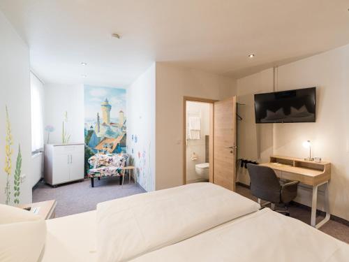 Postel nebo postele na pokoji v ubytování PrivatHotel Probst
