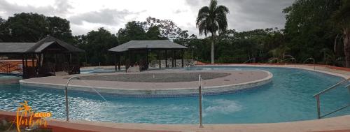 a large swimming pool in a resort at Villas Club Ámbar in Cacique