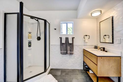 a bathroom with a shower and a sink at Stylish Palm Springs Home with Outdoor Oasis! in Palm Springs