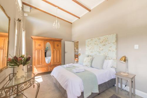 Ένα ή περισσότερα κρεβάτια σε δωμάτιο στο Libertas Guest Farm