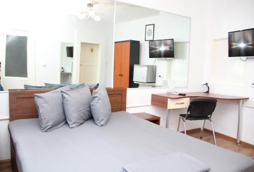 Ένα ή περισσότερα κρεβάτια σε δωμάτιο στο Anvar's Guests