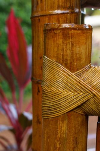 a wooden pole with a bundle of rope on it at Casa do Imperador in Fernando de Noronha