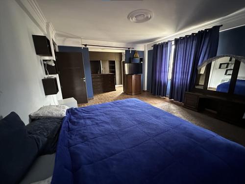 Cama o camas de una habitación en Amplio departamento para 4 pers.