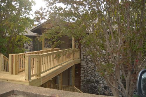 37DPD, Two bedroom, two bath log-sided condo with forest view condo