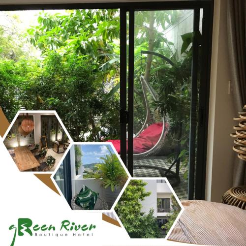 a room with a view of a garden outside a window at Green River Boutique Home in Vung Tau