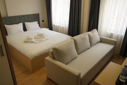 Postel nebo postele na pokoji v ubytování MOF Comfort Edirne